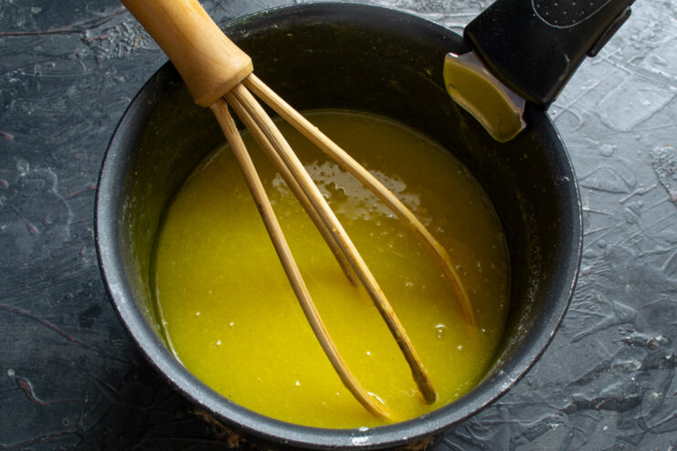 The Finished Lemon Curd: Vibrant, Creamy, and Delicious A bowl of perfectly smooth and vibrant yellow lemon curd, ready to be used.
