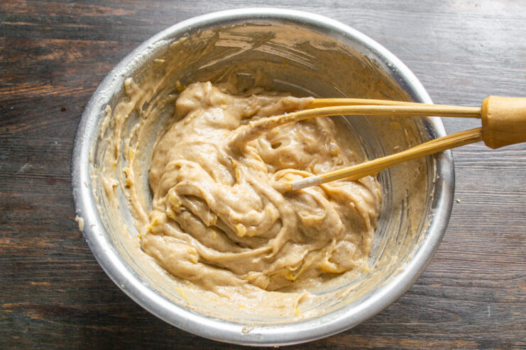 Step 6: The final muffin batter should be thick and fragrant A thick, well-mixed batter for orange and cinnamon muffins in a bowl.