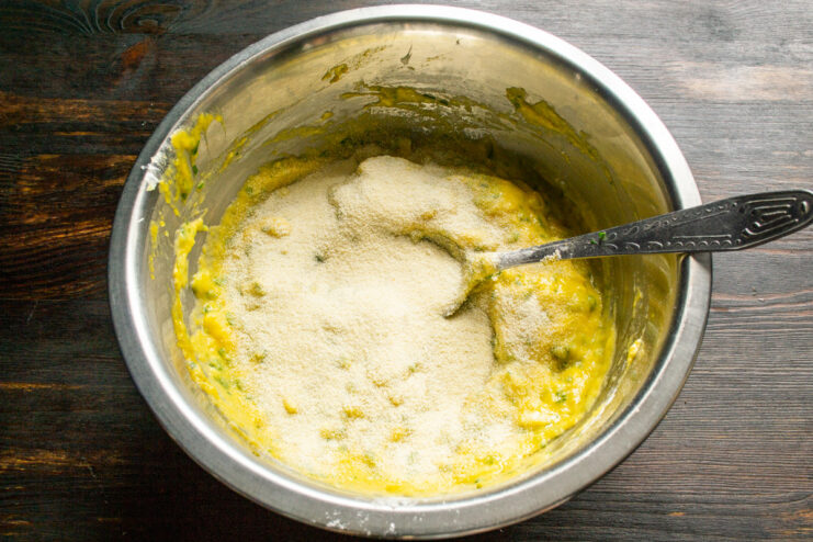 Resting the Batter is a Crucial Step. This allows the semolina to absorb moisture, resulting in fluffier pancakes. A bowl of prepared pumpkin and semolina pancake batter, ready to be rested.