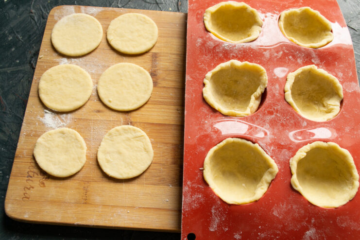 Preparing Dough Lids for the Filled Cookies Cutting smaller dough circles to be used as lids for the cookies.
