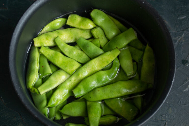 Pre-cooking Green Beans for the Vegetable Soup Green beans boiling in a pot of salted water.