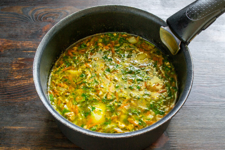 Letting the soup rest allows the flavors to meld together beautifully. The pot of finished ground meat and potato soup resting off the heat.