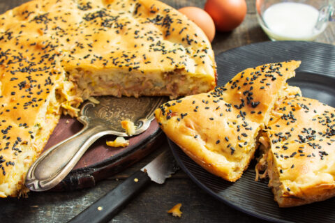 Russian Batter Pie with Cabbage and Stewed Meat
