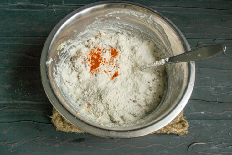 Adding spices and flour Mixing flour and spices into the buckwheat batter