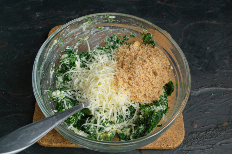 Pouring dry breadcrumbs into the bowl with the mixture