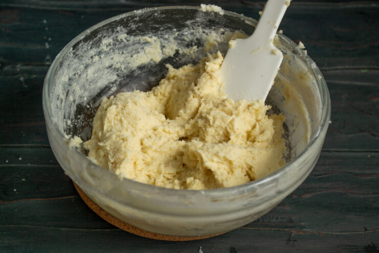 Checking dough consistency Finished soft shortbread dough in a bowl