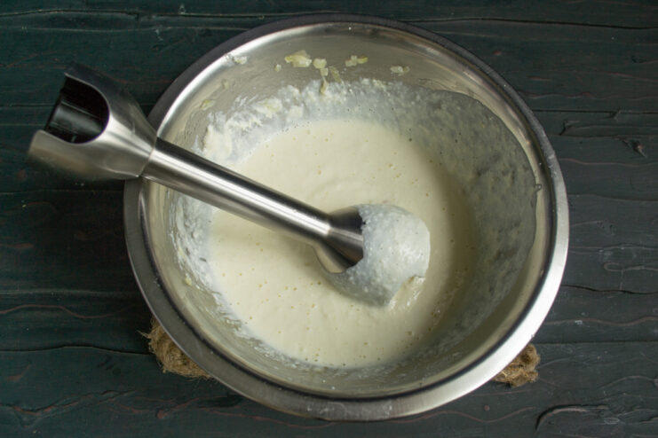 Blending the mixture Blending ingredients until smooth using an immersion blender