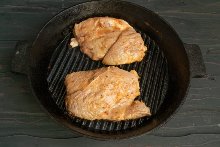 Pork on the Grill Pan Pork pieces searing on a smoking-hot ridged grill pan.