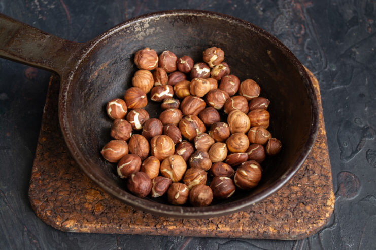 Toasting hazelnuts Hazelnuts being toasted in a dry skillet.