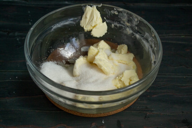 Creaming margarine with sugar Margarine mixed with sugar and vanilla in a bowl