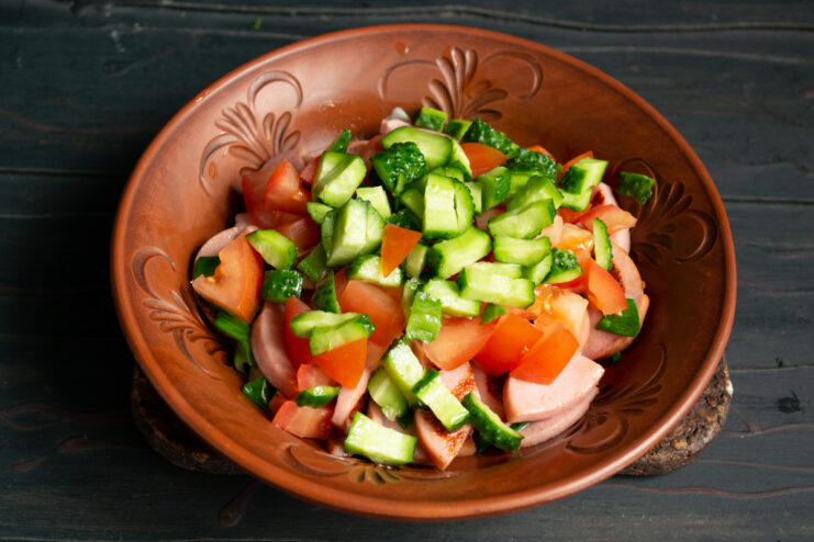 Cucumber Layer Finely diced cucumbers added to the salad bowl