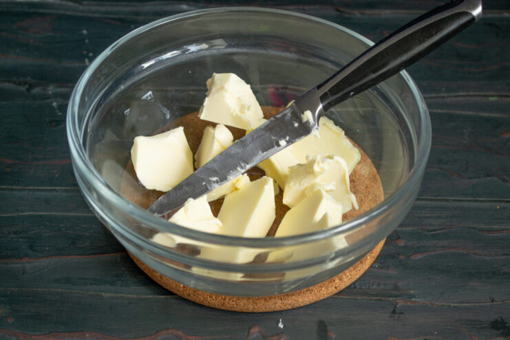 Preparing the margarine Diced margarine in a glass bowl
