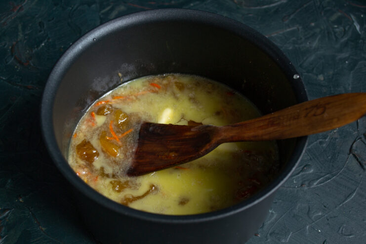 Boiling the honey mixture Heating the honey mixture in a saucepan