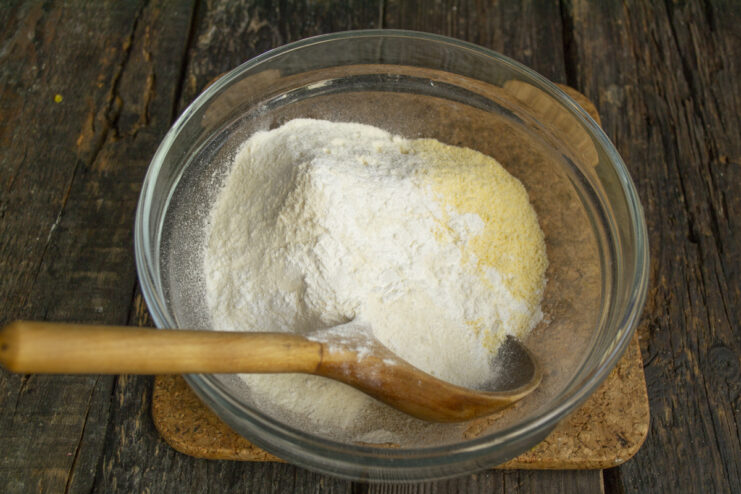 Whisking Dry Ingredients Whisking dry ingredients for pancakes in a mixing bowl