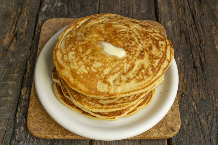 Stacking the Pancakes Stacking hot pancakes with melting butter on top