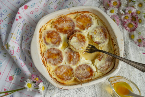 Baked Syrniki in Sour Cream Sauce