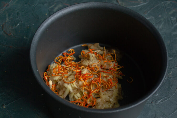 Prepping the banana base Grated banana and mandarin zest in a saucepan