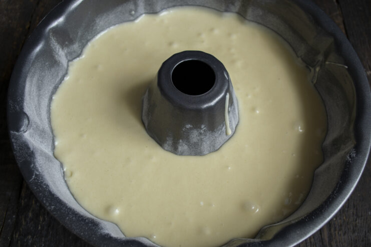 Getting Ready for the Oven Cake batter poured into a greased bundt pan