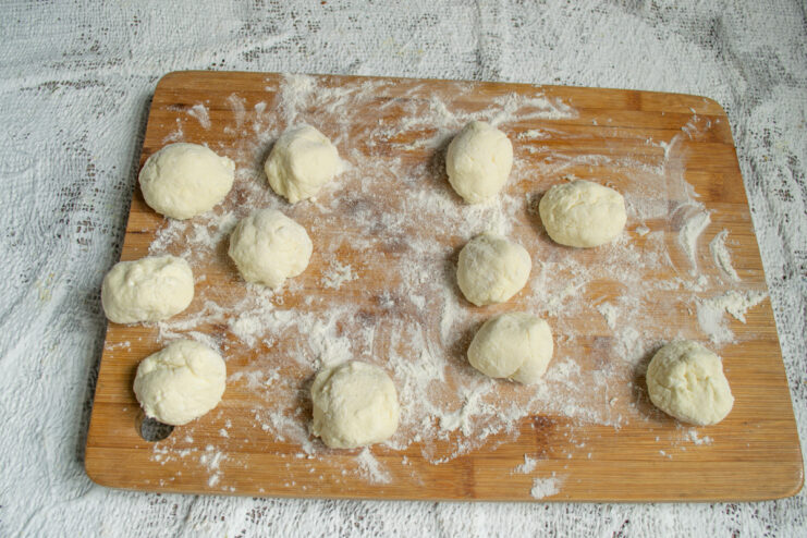 Shaping And Dredging Shaping small dough balls and rolling them in flour