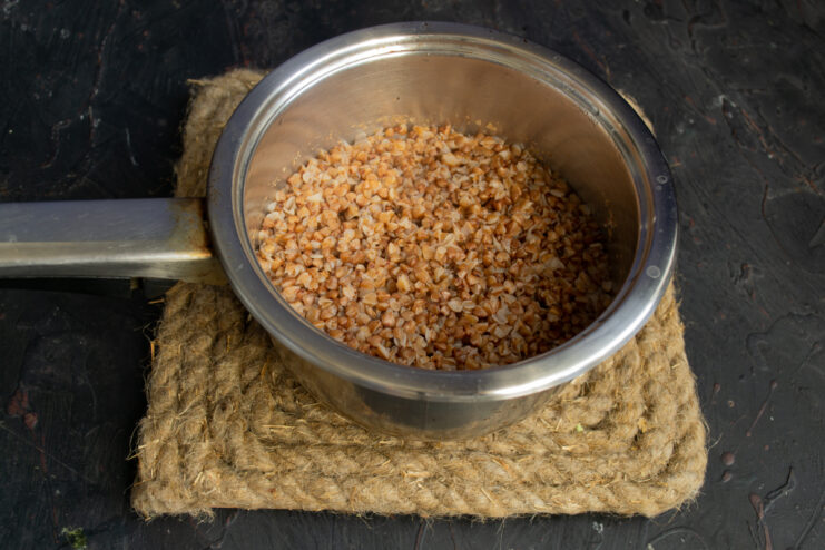 Cooked buckwheat groats Fluffy cooked buckwheat groats in a pot