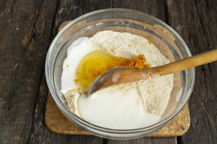 Flavoring the Batter Egg and freshly grated orange zest added to pancake batter
