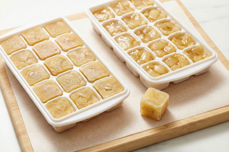 Batch cooking sautéed onions for freezer prep Frozen sautéed onions in silicone ice cube trays for meal prep