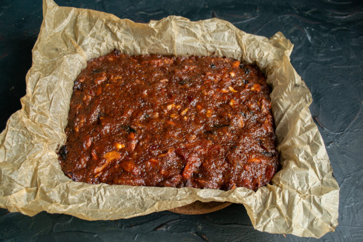 Freshly baked panforte Baked panforte resting in its dish