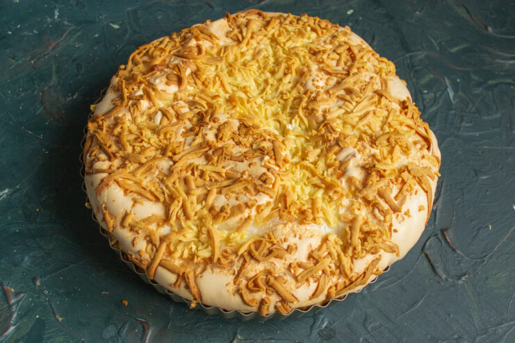 Baked pie resting in oven Freshly baked golden Polish apple pie sitting in a baking pan