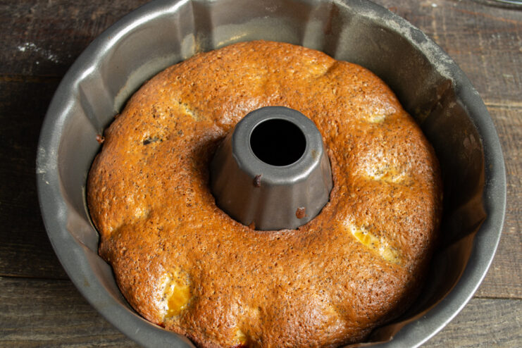 Baked cake in the pan Golden baked cake fresh from the oven in a baking pan