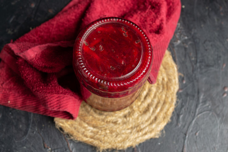 Final canning stage Sealed jar of borsch base inverted on its lid to cool.