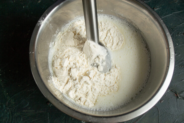 Adding flour to the liquid crepe batter