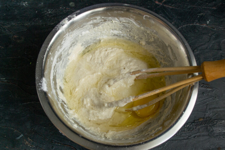 Enriching the batter Adding an egg and oil to the risen pancake batter