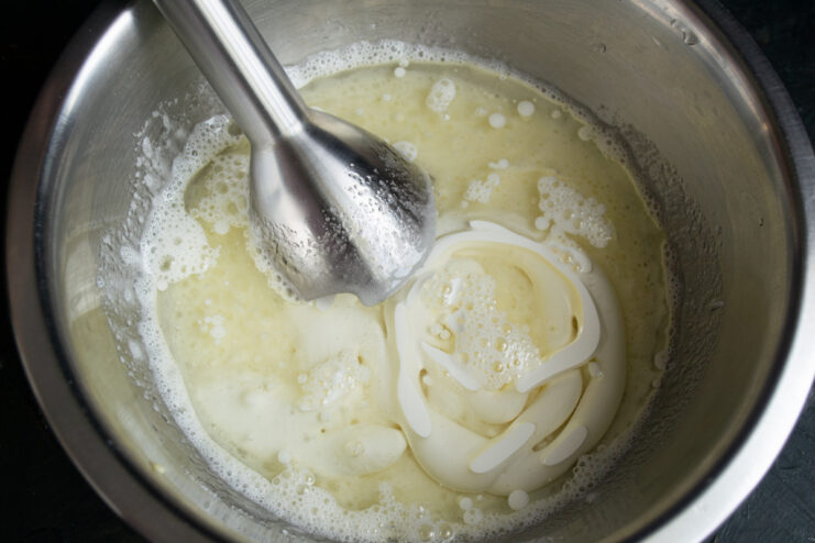 Adding full-fat sour cream to the liquid batter base