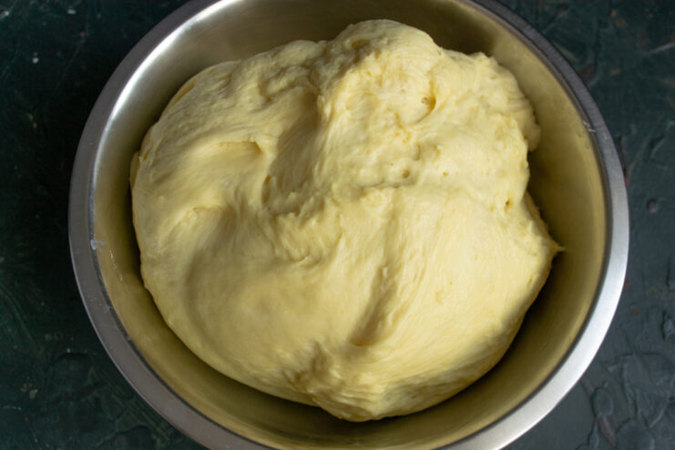 Proofed Dough Risen yeast dough in a mixing bowl