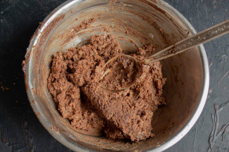 Thick mixture ready for shaping truffles in a bowl.
