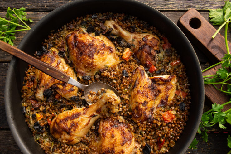 Finished chicken with buckwheat and mushrooms in a skillet