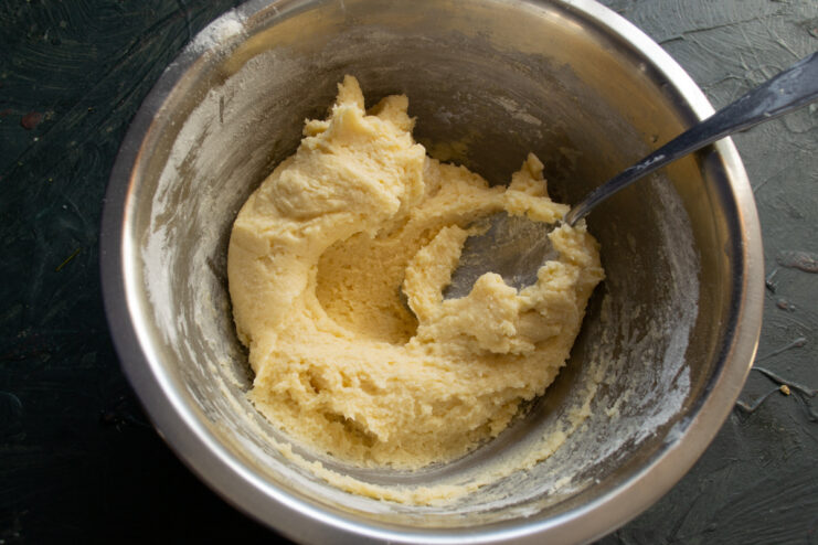 Mixing the sticky dough Thick and sticky scone dough ready to be shaped