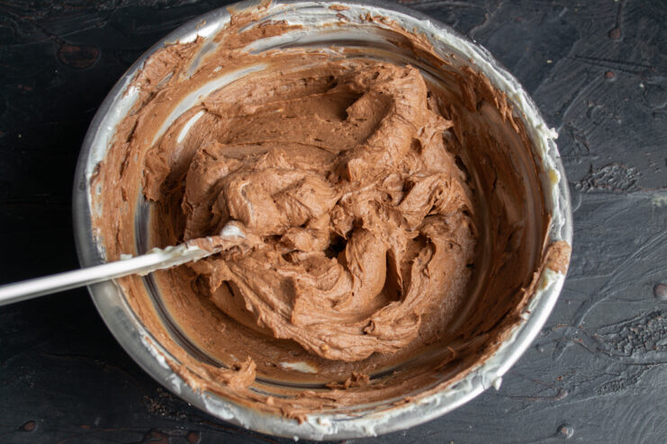 Chocolate mousse ready Finished thick chocolate mousse in a metal mixing bowl