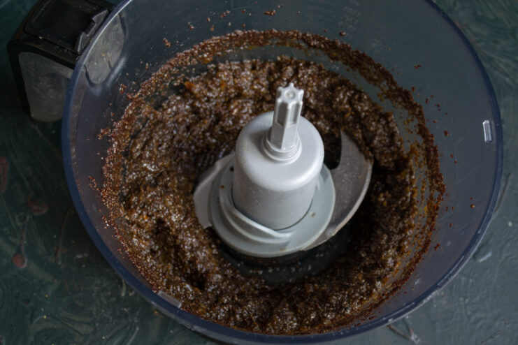 Blending the Mixture Thick poppy seed filling inside a food processor bowl