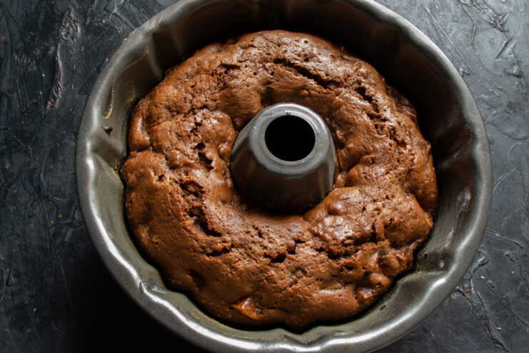 Freshly baked cake Baked chocolate cake in a round baking pan