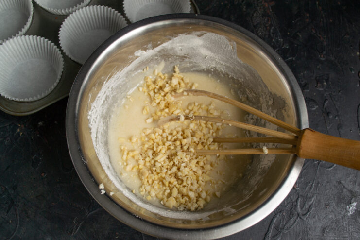 Coarsely crushed almonds folded into the muffin batter