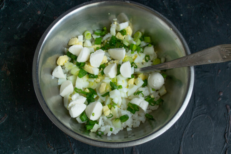 Mozzarella cheese cubes added to the rice filling mixture