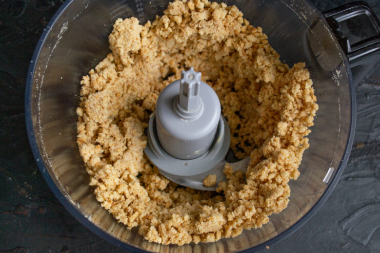 Cookie base texture Thick and crumbly mixture of crushed cookies and butter after blending