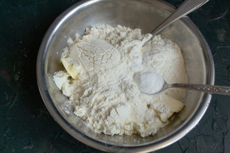 Flour and baking powder added to the cheese mixture