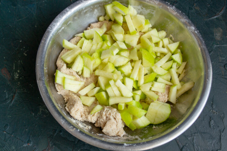 Diced green apples added to the dough