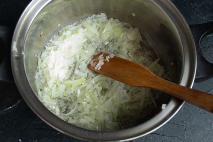 Sauteing the diced onions Diced onions sauteing in a pot with hot oil