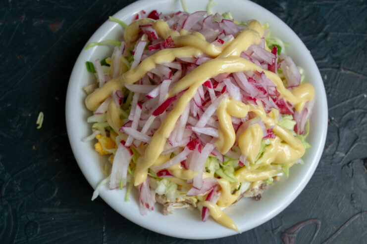 Radish layer for the salad Matchstick radishes coated with mayonnaise