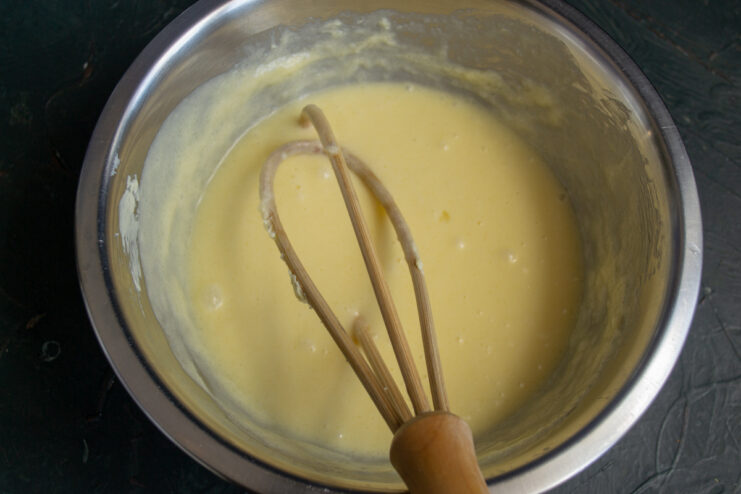 Wet Batter Base Smooth wet batter base for the cake in a mixing bowl