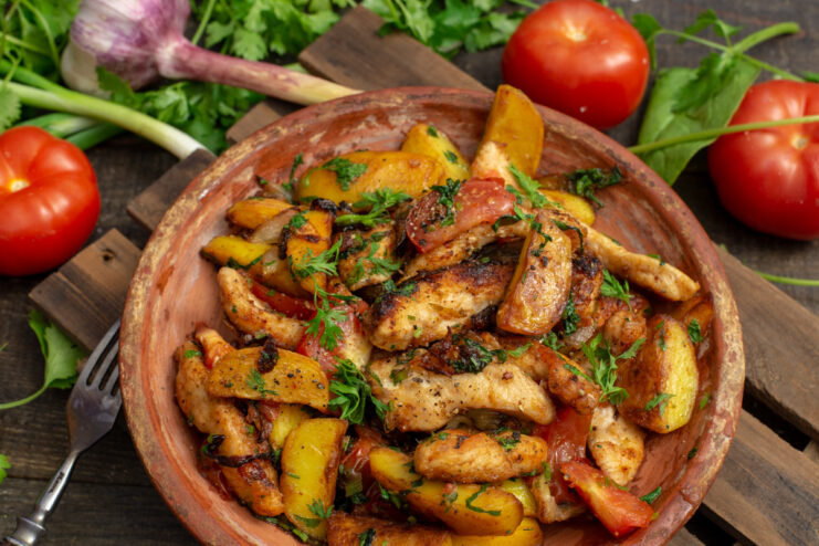 Aromatic chicken ojakhuri in a clay pot
