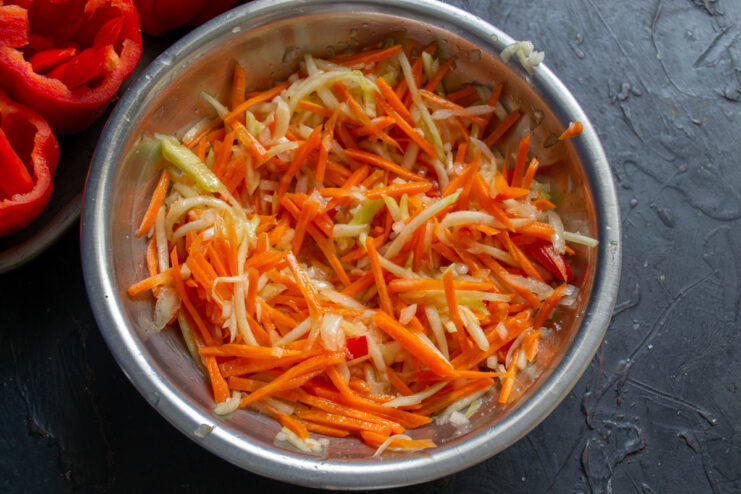 Marinating the vegetable filling Mixed vegetable filling resting in its own juices in a bowl